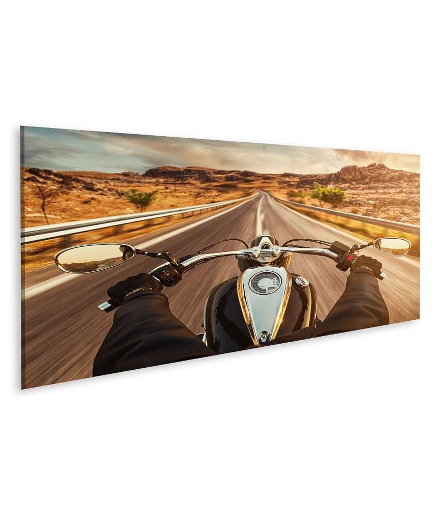 Islandburner Bild auf Leinwand Motorradfahrer allein auf US-Highway, umgeben von atemberaubendem Sonnenuntergang