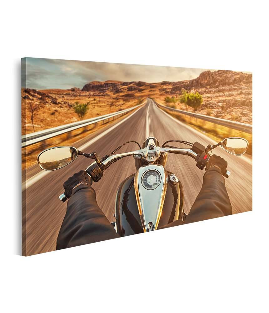 Islandburner Bild auf Leinwand Motorradfahrer allein auf US-Highway, umgeben von atemberaubendem Sonnenuntergang