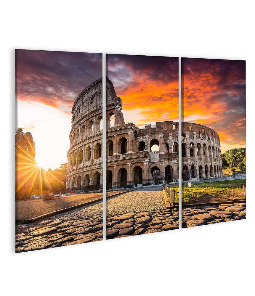 Islandburner Bild auf Leinwand Sonnenaufgang über dem Kolosseum in Rom, Italien - Sommerurlaubszene