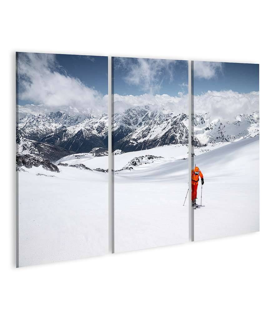 Islandburner Bild auf Leinwand Freerider in gelbem Skianzug und Rucksack in dynamischer Aktion Bis zu 60% Rabatt