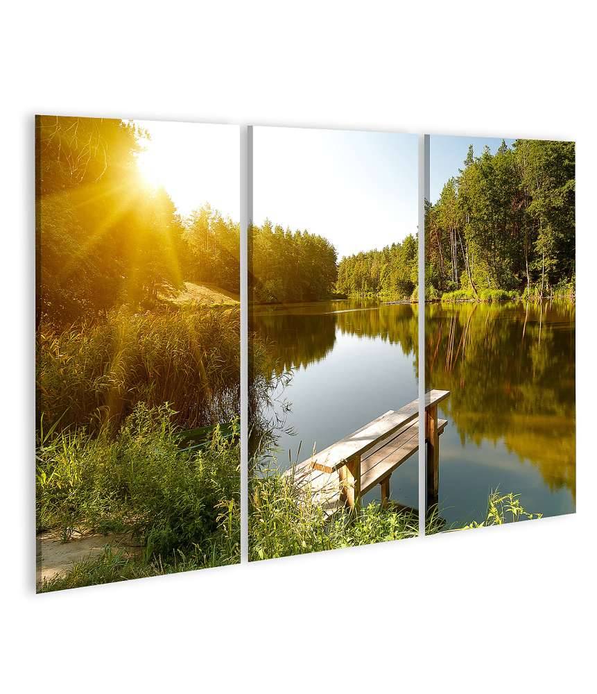 Islandburner Bild auf Leinwand Idyllische Sommerlandschaft mit Waldsee unter strahlendem Sonnenschein