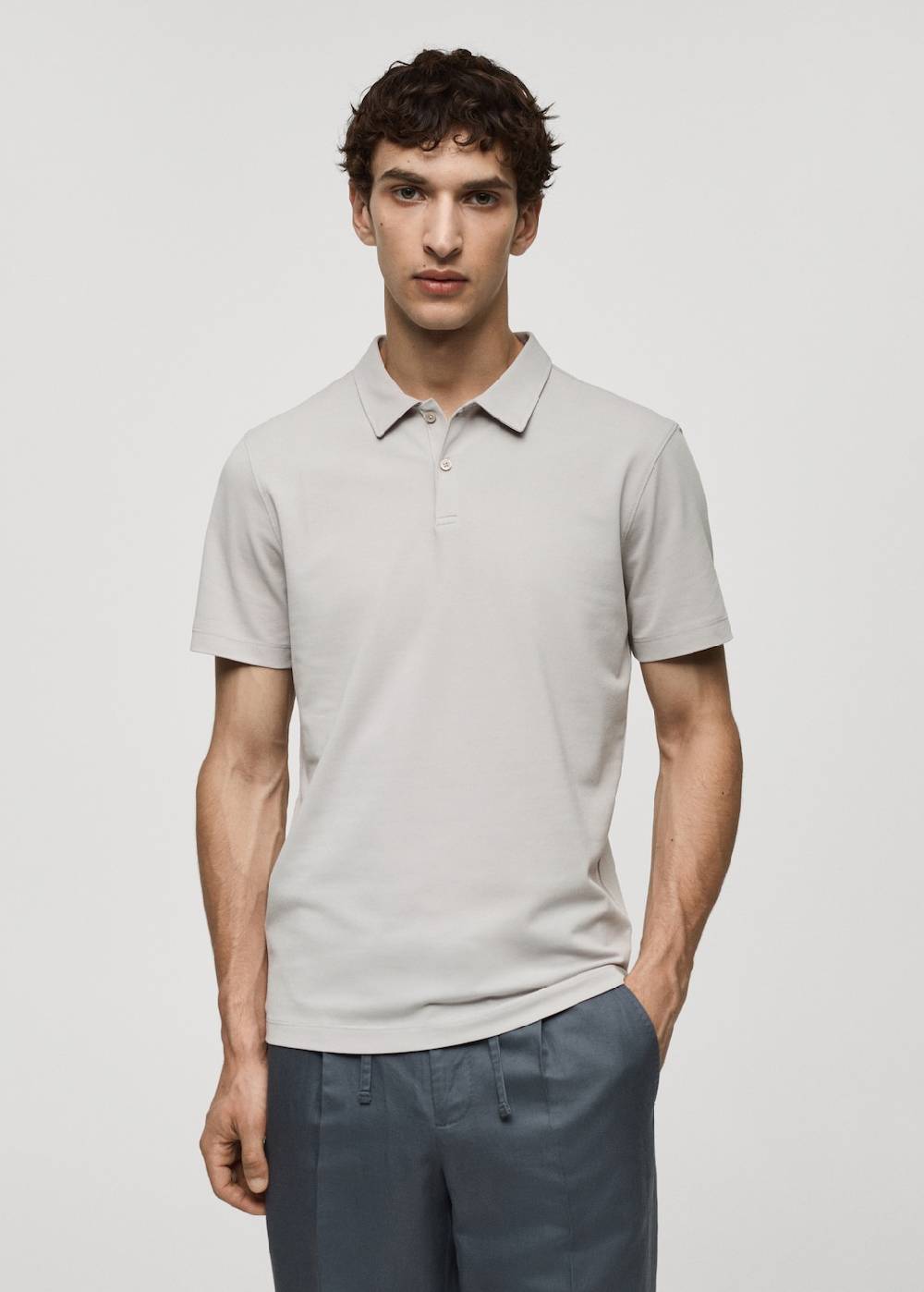 Mango Strukturiertes Slim-Fit-Poloshirt aus Baumwoll-Piqué Speichern exportieren