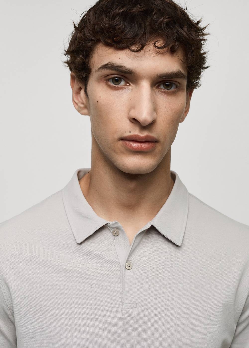 Mango Strukturiertes Slim-Fit-Poloshirt aus Baumwoll-Piqué Speichern exportieren