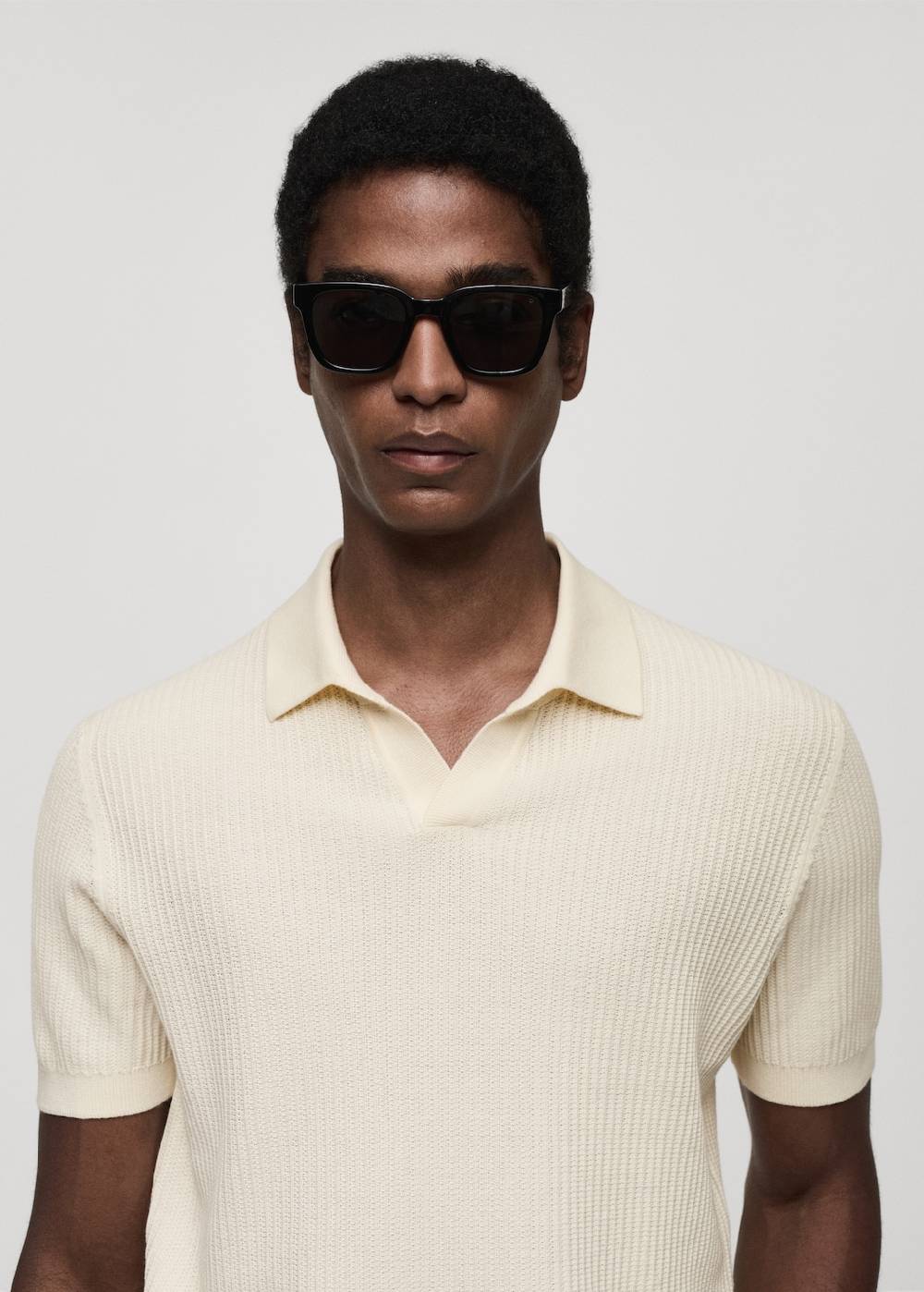 Mango Geripptes Strick-Poloshirt aus Baumwolle Begrenzt auf 3 Tage